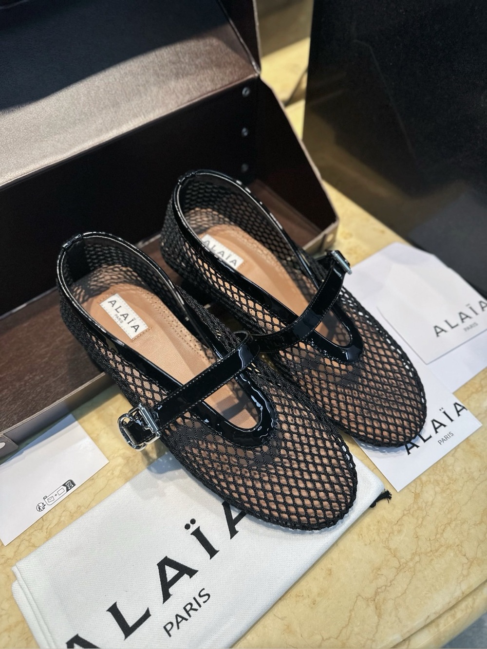 ALAIA Black Fishnet Mesh Mary Jane Flat Shoes